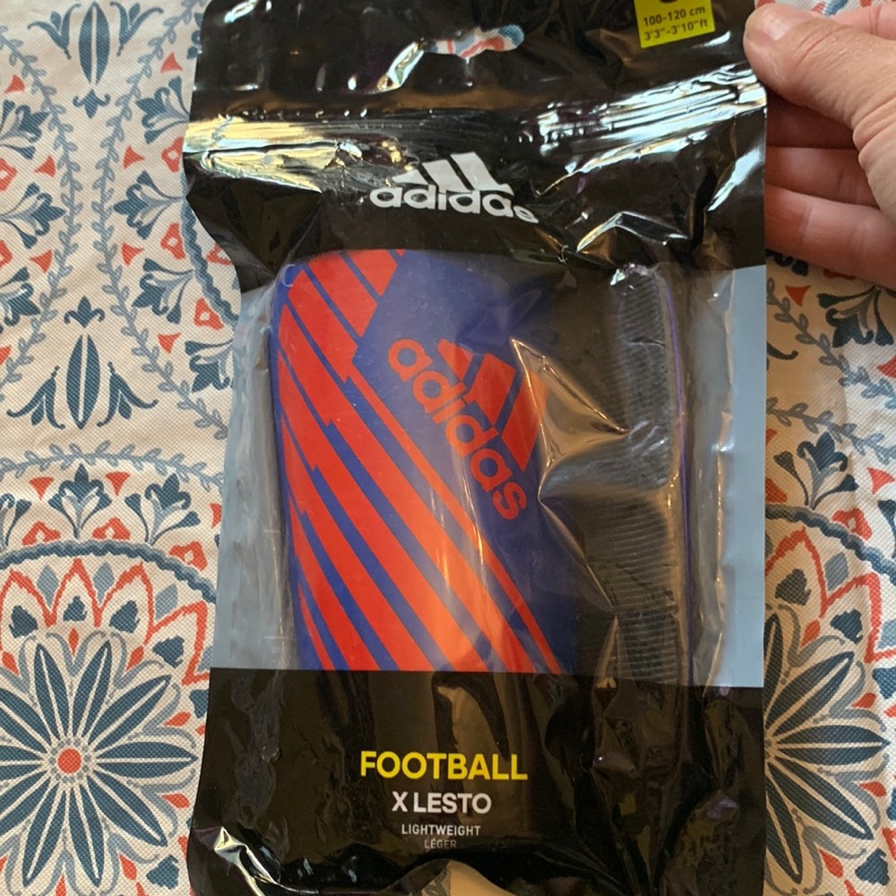 New in bag little boys shin guards